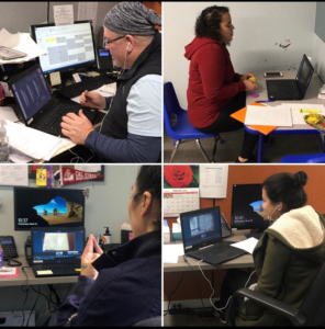 Associates at their computers providing remote therapy