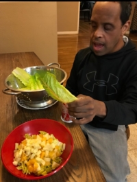 Jeffrey prepares a salad