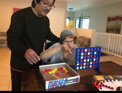 Peter Caranto playing Connect Four with Martin